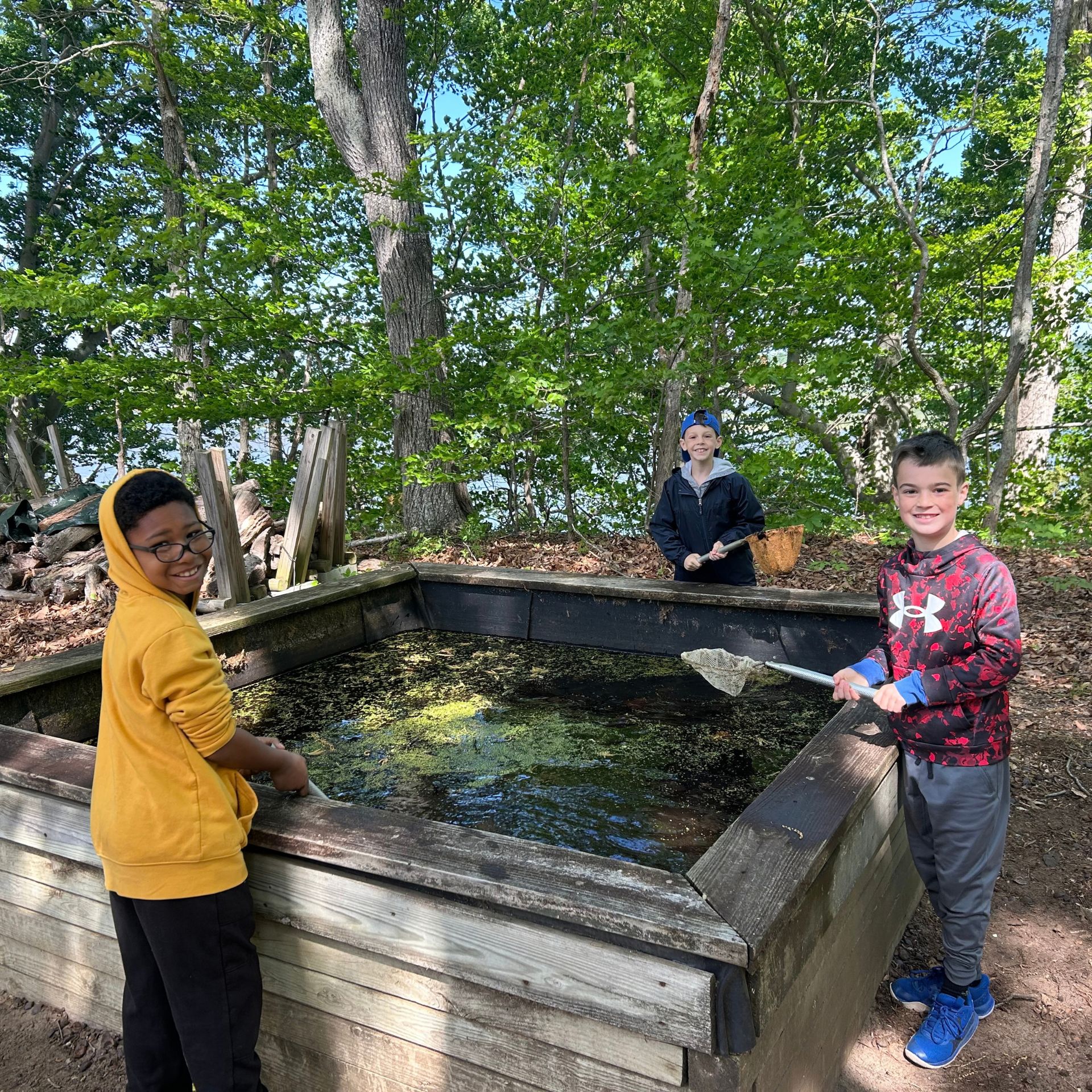 Elementary Students around pond