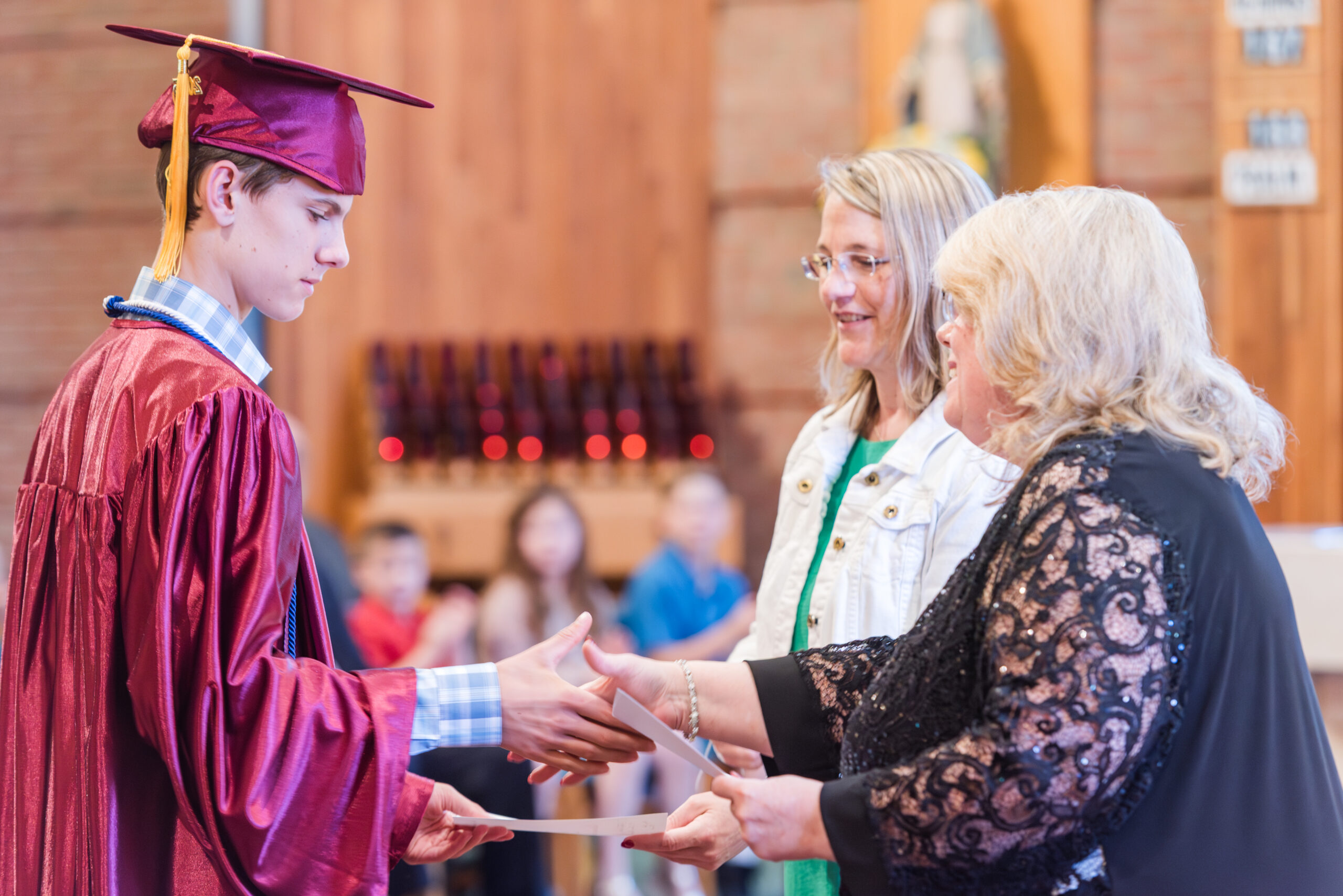 SOTI student receiving diploma during graduation